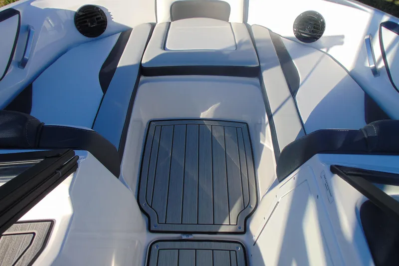 Slide: The Image of Interior view of 2026 Yamaha Boats 195S, featuring sleek seating and modern design. - 21