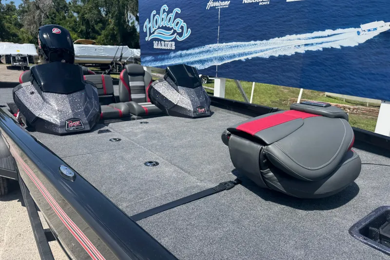 Slide: The Image of 2025 Ranger RT188P boat interior with seating and storage, displayed at Holiday Marine. - 5