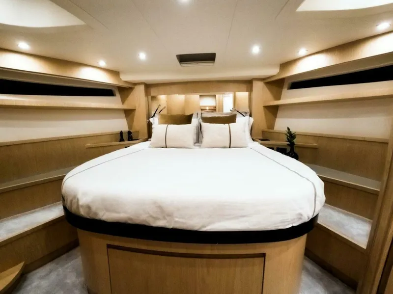 Slide: The Image of Luxurious bedroom interior of 2025 OKEAN 52 yacht with modern design and ambient lighting. - 35