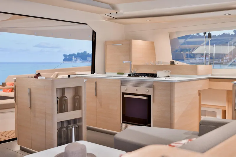 Slide: The Image of Modern kitchen interior of 2026 Fountaine Pajot 48 yacht with ocean view. - 10