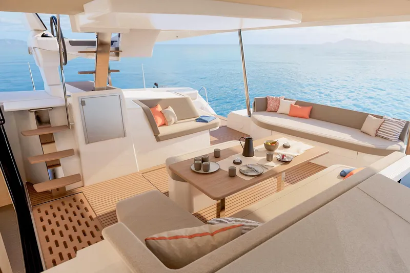 Slide: The Image of Luxurious 2026 Fountaine Pajot 48 yacht interior with elegant seating and ocean view. - 16