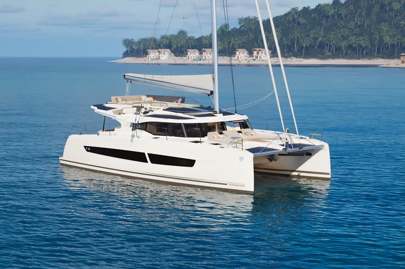 Slide: The Image of 2026 Fountaine Pajot 48 catamaran sailing in tropical waters near lush island. - 41