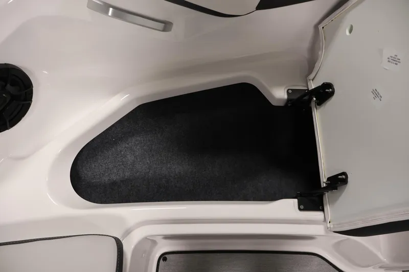 Slide: The Image of Interior storage compartment of 2026 Yamaha Boats AR195, featuring sleek design and durable materials. - 14