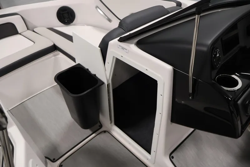 Slide: The Image of Interior view of 2026 Yamaha Boats AR195, featuring seating and storage area. - 16