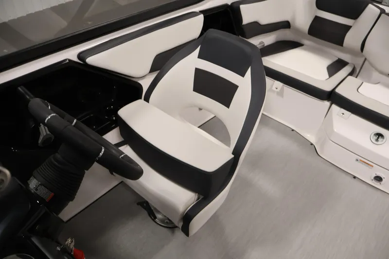 Slide: The Image of 2026 Yamaha Boats AR195 interior with sleek black and white seating design. - 26