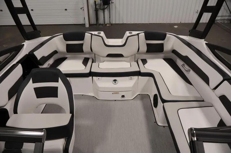 Slide: The Image of 2026 Yamaha Boats AR195 interior with sleek black and white seating design. - 29