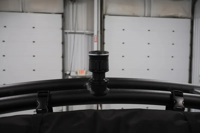 Slide: The Image of Close-up of 2026 Yamaha AR195 boat's black metal frame in a garage setting. - 32