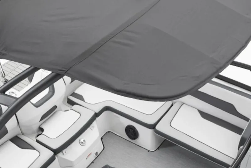 Slide: The Image of 2026 Yamaha Boats AR195 interior with seating and canopy, showcasing modern design. - 38