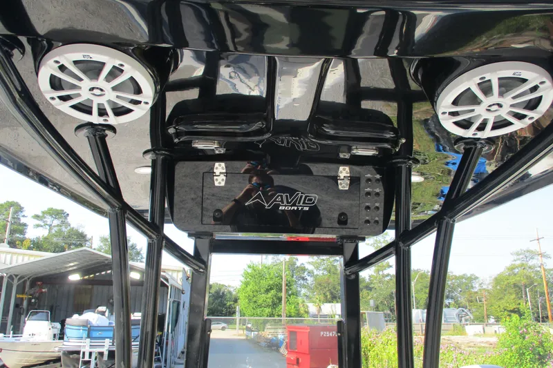 Slide: The Image of Avid 23 Fusion 2026 boat interior with speakers and control panel. - 12