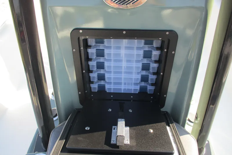 Slide: The Image of Storage compartment with tackle boxes in 2026 Avid 23 Fusion boat. - 17