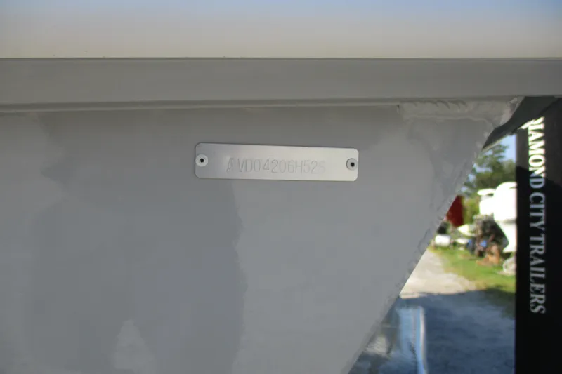Slide: The Image of 2026 Avid 23 Fusion boat hull identification number plate. - 18