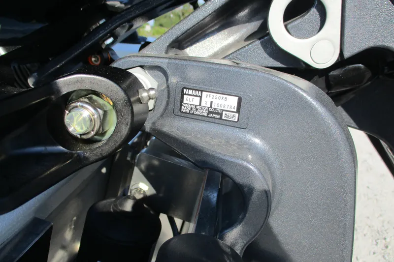 Slide: The Image of Close-up of Yamaha VF250XB engine part on 2026 Avid 23 Fusion boat. - 19