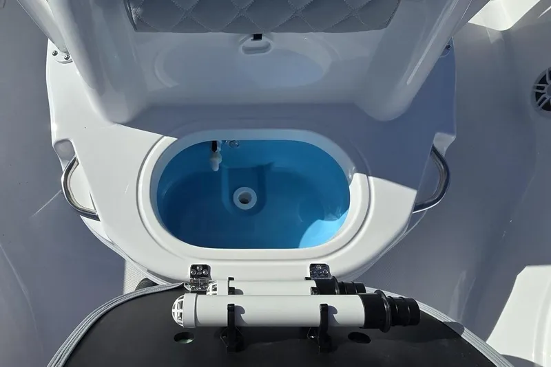 Slide: The Image of Livewell on 2026 NauticStar 224 Bay boat, featuring sleek design and functionality. - 18