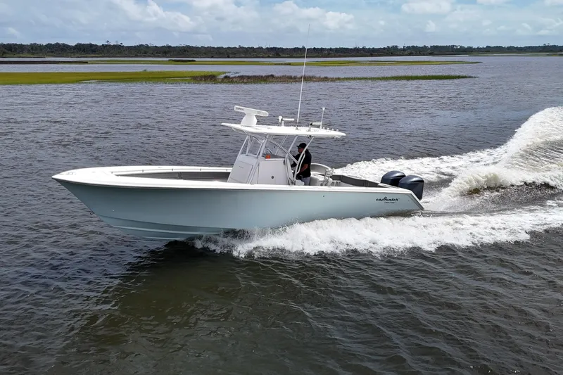 The Image of 2013 SeaHunter 33 Tournament boat docked at Palm Cove Marina. - 0