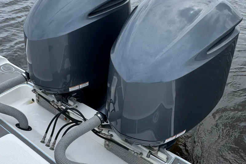 Slide: The Image of Twin outboard motors on a 2013 SeaHunter 33 Tournament boat. - 20