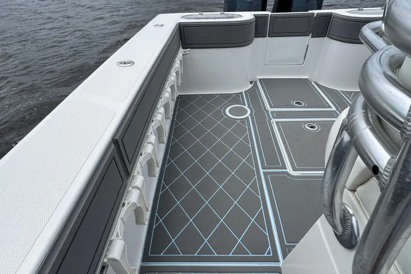 Slide: The Image of 2013 SeaHunter 33 Tournament boat deck with sleek, modern design and ample storage. - 28