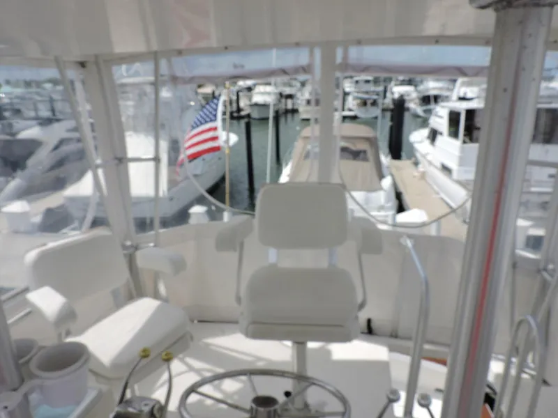 Slide: The Image of Cockpit view of 1990 Post 44 Sport Fisherman yacht in marina. - 17