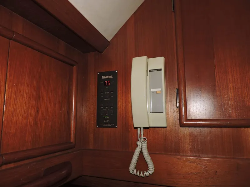 Slide: The Image of Wall-mounted phone and control panel on 1990 Post 44 Sport Fisherman yacht. - 33