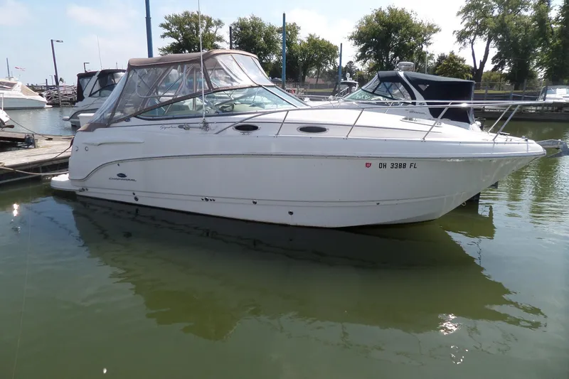 The Image of 2005 Chaparral Signature 270 boat docked in marina, side view. - 0