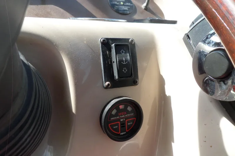 Slide: The Image of Control panel of a 2005 Chaparral Signature 270 boat with anchor switch and fume detector. - 23