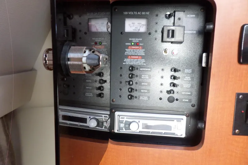 Slide: The Image of Electrical control panel inside 2005 Chaparral Signature 270 boat cabin. - 30