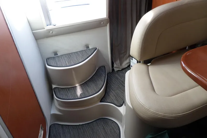 Slide: The Image of Interior of 2005 Chaparral Signature 270 boat with steps and seating area. - 38