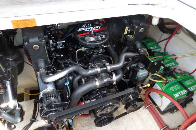 Slide: The Image of Engine compartment of 2005 Chaparral Signature 270 with Mercury MerCruiser 4.3 motor and batteries. - 51