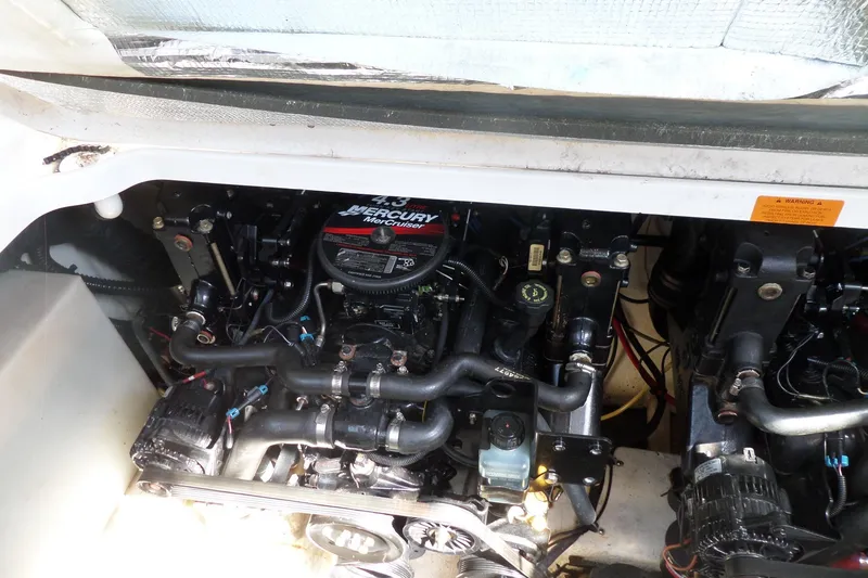 Slide: The Image of Engine compartment of 2005 Chaparral Signature 270 with Mercury MerCruiser components. - 52