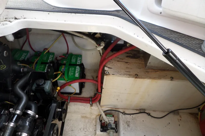 Slide: The Image of Engine compartment of 2005 Chaparral Signature 270 with Interstate batteries and wiring. - 53