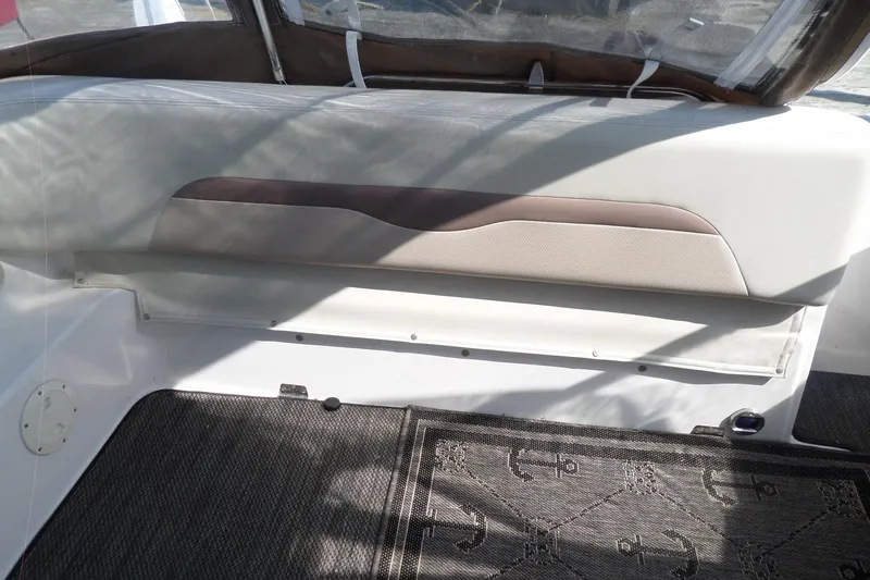Slide: The Image of Interior seating of 2005 Chaparral Signature 270 boat with anchor-patterned carpet. - 60