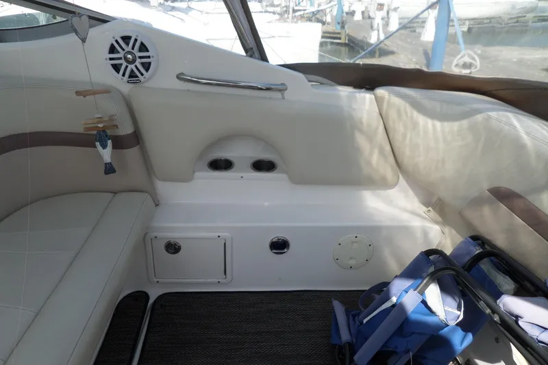 Slide: The Image of Interior of 2005 Chaparral Signature 270 boat with seating and storage compartments. - 9