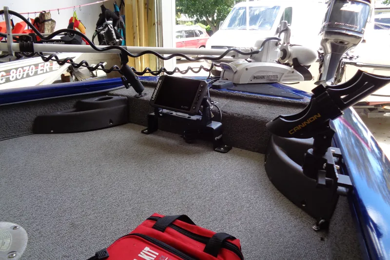 Slide: The Image of 2018 Bass Tracker PT175 boat interior with fishing equipment and electronics. - 4