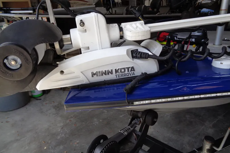 Slide: The Image of Minn Kota Terrova motor on 2018 Bass Tracker PT175 boat, garage setting. - 5