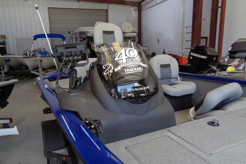 Slide: The Image of 2018 Bass Tracker PT175 boat with Garmin equipment in a storage facility. - 8