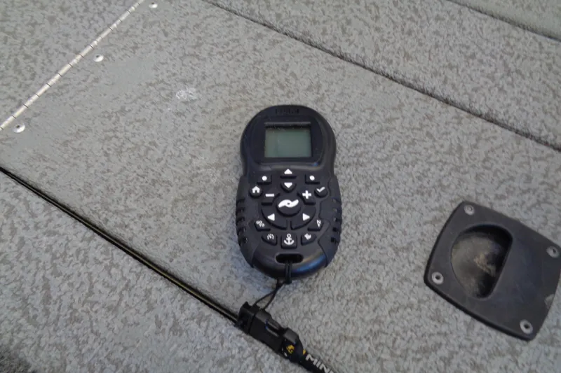 Slide: The Image of Remote control on Bass Tracker PT175 boat deck, 2018 model. - 9
