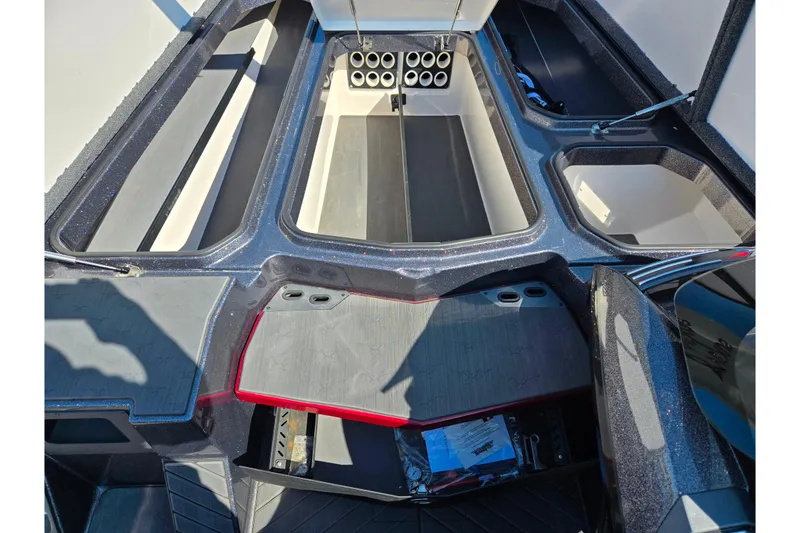 Slide: The Image of 2025 Vexus VX21 boat interior with spacious storage compartments and sleek design. - 13