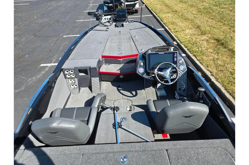 Slide: The Image of 2025 Vexus VX21 boat interior with modern dashboard and seating. - 14
