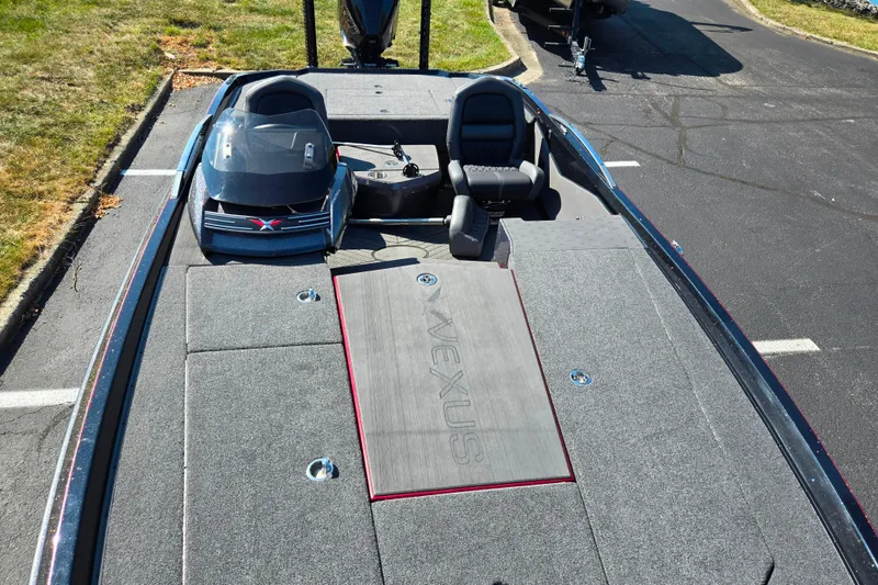 Slide: The Image of 2025 Vexus VX21 boat interior with seating and storage compartments. - 22