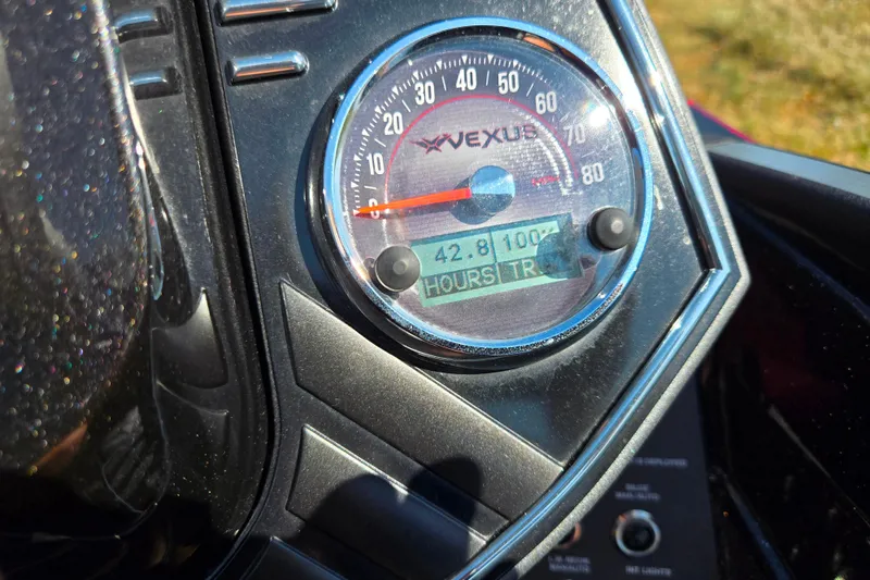 Slide: The Image of Close-up of Vexus VX21 2025 speedometer displaying 42.8 hours. - 29