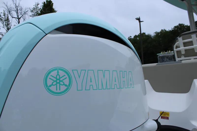 Slide: The Image of Yamaha engine on 2026 Key West 219 FS boat, featuring sleek design and branding. - 12