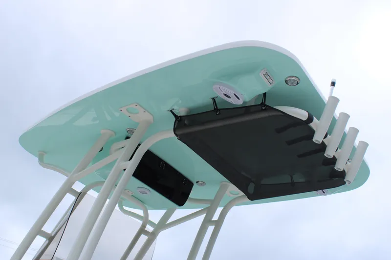 Slide: The Image of 2026 Key West 219 FS boat T-top with rod holders and speakers. - 9