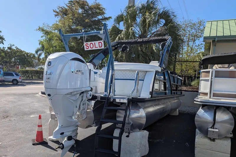Slide: The Image of 2026 Trifecta 25RF SS pontoon boat with Yamaha engine, marked as sold. - 10