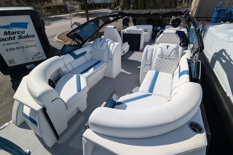 Slide: The Image of Luxurious 2026 Trifecta 25RF SS pontoon boat interior with plush seating and modern design. - 7