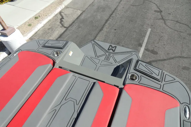 Slide: The Image of 2022 Heyday WT Surf boat with red and gray seating, viewed from above. - 24