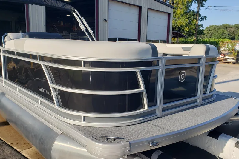 The Image of 2026 Godfrey 2086C SE pontoon boat with sleek design and comfortable seating. - 0