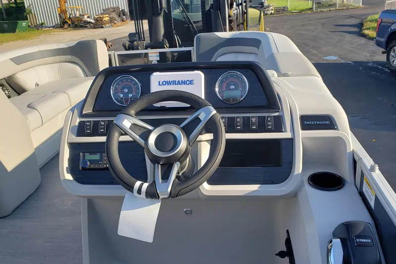 Slide: The Image of Steering console of 2026 Godfrey 2086C SE boat with Lowrance electronics. - 3