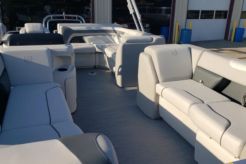 Slide: The Image of Luxurious interior of 2026 Godfrey 2086C SE boat with spacious seating. - 5