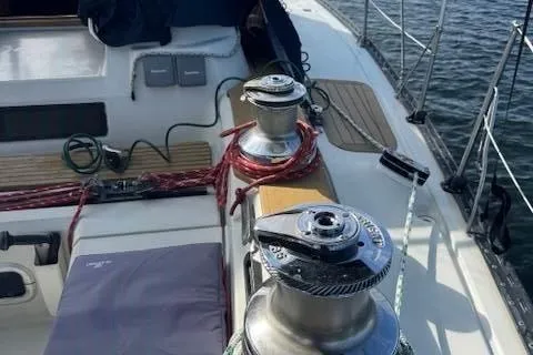 Slide: The Image of Deck of 1988 C&C 44 sailboat with winches and ropes. - 3