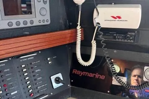 Slide: The Image of Control panel of a 1988 C&C 44 yacht with Raymarine and Standard Horizon equipment. - 9