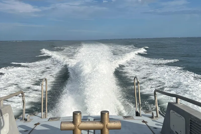 Slide: The Image of Wake trail behind a 2004 Kvichak Marine Industries Pilot boat on open water. - 1